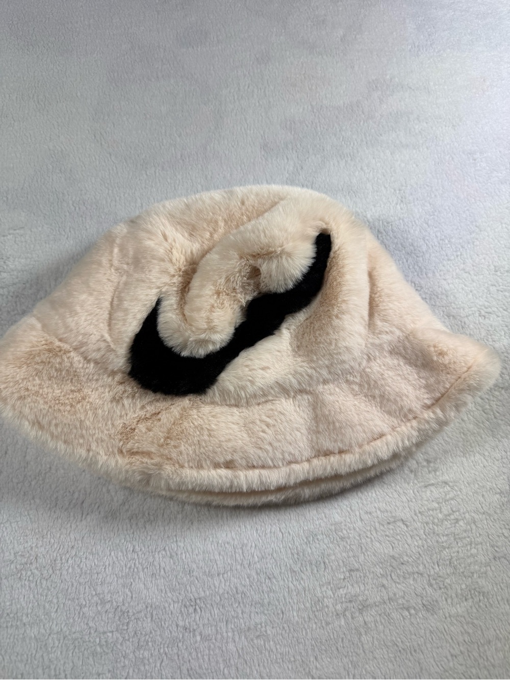 Nike Beige Faux Fur Bucket Hat with Black Swoosh